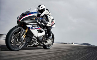 Man motorcycle road mountains clouds - cloudy free wallpaper