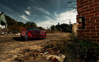Red car brick wall broken - a red car free wallpaper