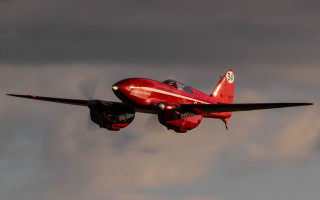 Red airplane cloudy sky pilot - f 8 aperture free wallpaper