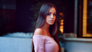 Woman pink top outside bokeh - a pink top free wallpaper