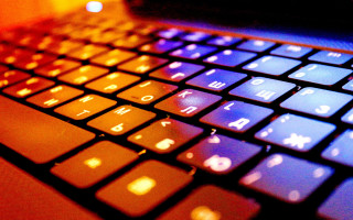 Keyboard illuminated backlighting autumn fire - a close up of a keyboard free wallpaper