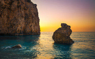 Ocean sunset rocks beach boat - exekia free wallpaper