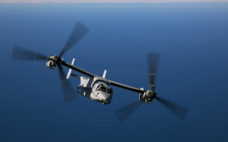 Military plane ocean clear day - the back of the plane free wallpaper