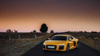 Yellow sports car dusk urban - a yellow sports car free wallpaper