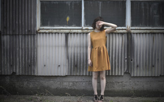 Yellow dress standing rain outdoors - a yellow dress free wallpaper
