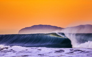 Large wave mountain sunset person - sunset free wallpaper