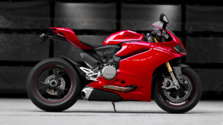 Red motorcycle garage black background - a red motorcycle free wallpaper