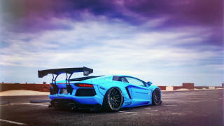 Blue sports car parking lot 10 - a parking lot free wallpaper