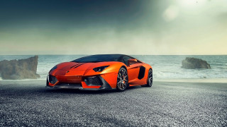 Orange sports car ocean dark - nice free wallpaper