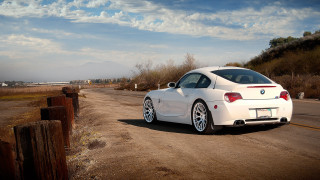 White car road hill clouds - scenery free wallpaper