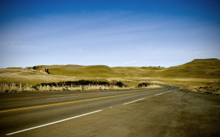 Desolate hill road mountain sky - a hill in the background free wallpaper