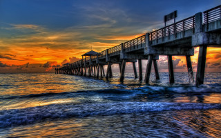 Sunset pier ocean waves beach - a pier free wallpaper