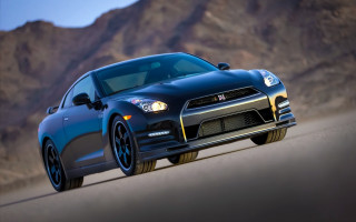 Black sports car desert mountains - a road in the desert free wallpaper
