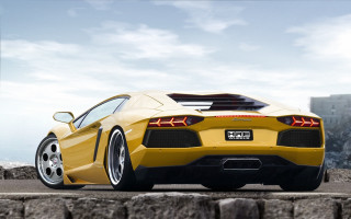 Yellow sports car street stone - a yellow sports car free wallpaper