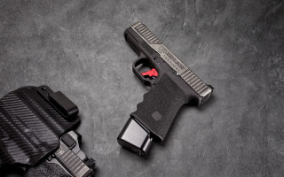 Gun holster gray background red - 30mm free wallpaper