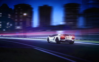 White sports car night city 10 - a city street free wallpaper