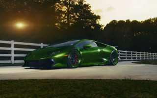 Green sports car night fence - a white fence free wallpaper