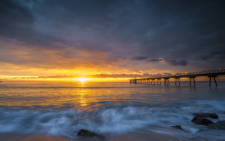 Pier sunset beach waves dusk - a pier free wallpaper