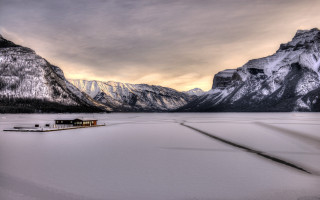 Snowy mountains lake house sunset - a snowy landscape free wallpaper