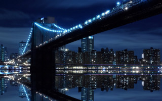 Night city bridge lights water 2 - a city in the background free wallpaper