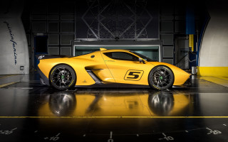 Yellow sports car garage clock - the wall behind free wallpaper