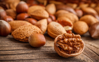 Wooden table nuts nutshells background - a wooden table free wallpaper