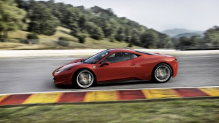 Red sports car race track 22 - the background and a mountain in the distance free wallpaper