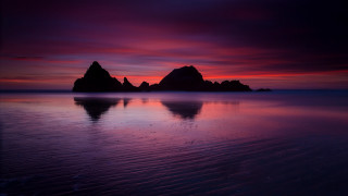 Sunset rocks purple sky clouds - rich moody colour free wallpaper