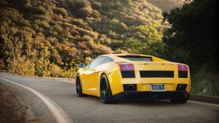 Yellow sports car mountains california - a yellow sports car free wallpaper