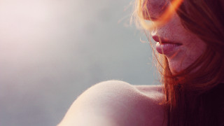 Freckled woman cellphone blurry background - anton fadeev free wallpaper
