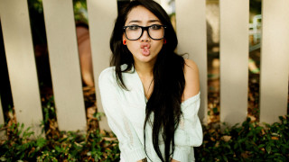 Funny face woman glasses outdoors - glass free wallpaper