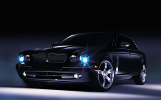 Black car two lights headlights - a black car free wallpaper