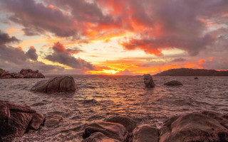 Sunset ocean rocks mountains cloudy - colorful cloud free wallpaper