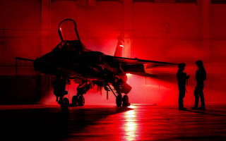 Fighter jet night tarmac person - intimidating lighting free wallpaper