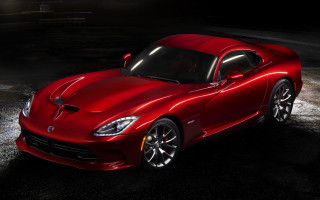Red sports car night spotlight - a parking lot free wallpaper