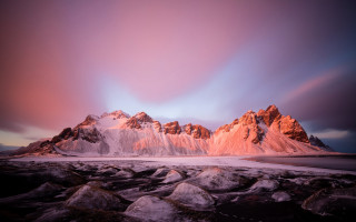 Mountain range pink sky rocks - a few cloud free wallpaper