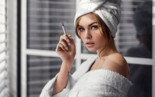 Woman towel holding cigarette fur - a cigarette free wallpaper for desktop