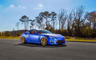 Blue car road trees grass - blue sky free wallpaper