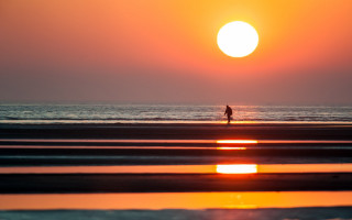 Beach sunset ocean mountain sky - a photo free wallpaper
