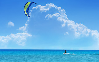 Surfboard wave ocean cloudy sky - a person riding free wallpaper
