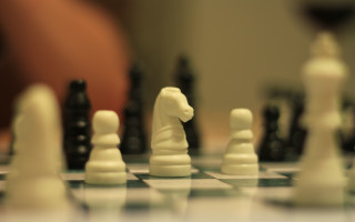 Chessboard white horse black pieces - a white horse free wallpaper