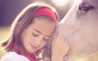 Girl kissing horse red bandana - close free wallpaper