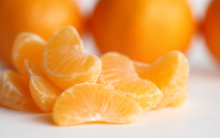 Orange pile rayonism blurry background - a white table next free wallpaper