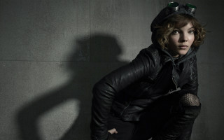 Woman leather jacket cat hat - a shadow free wallpaper