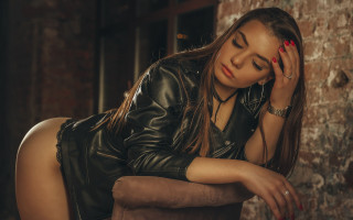 Woman leather jacket closed eyes - artur tarnowski free wallpaper