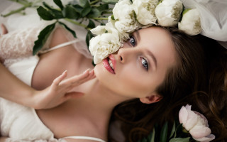 Wedding dress laying flowers portrait - a woman in a wedding dress free wallpaper