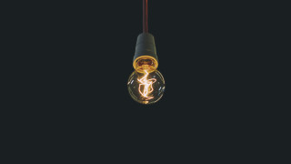 Lightbulb light inside black background - inside free wallpaper