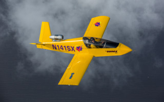Yellow airplane cockpit cloudy sky - inside free wallpaper