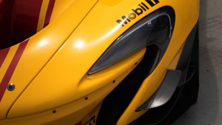 Yellow sports car red stripes - a yellow sports car free wallpaper