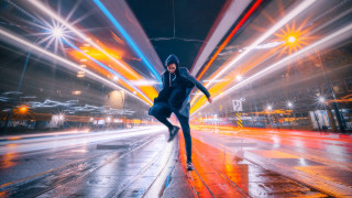 Skateboarder wet night city lights - daniel lieske free wallpaper